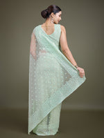 Thumbnail for Monjolika Fashion Women'S Light Green Soft Net SareeWith Sequin Embellished Border And Pallu - Distacart