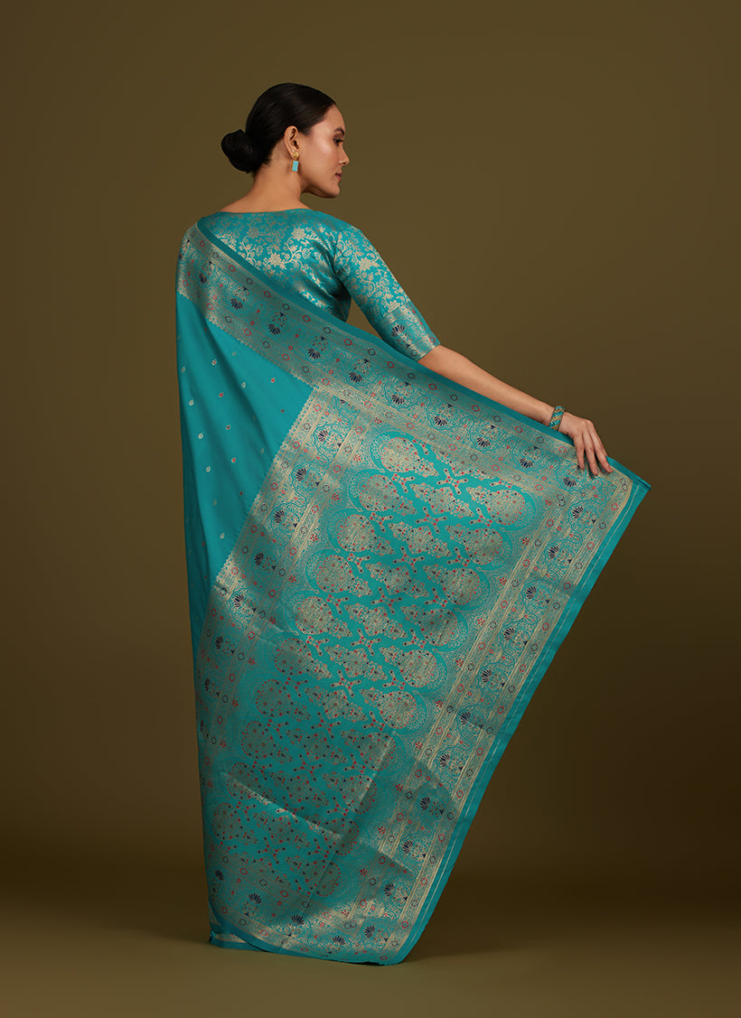 Monjolika Fashion Elegant Cyan Banarasi Silk Blend SareeBrocade Motifs & Zari Woven Splendor - Distacart