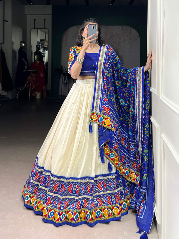 Lorenvalley Fashion Offwhite Tasar Silk Patola Print With Foil Work And Real Mirror Gamthi Work With Lace Touch Up Lehenga Choli with Dupatta