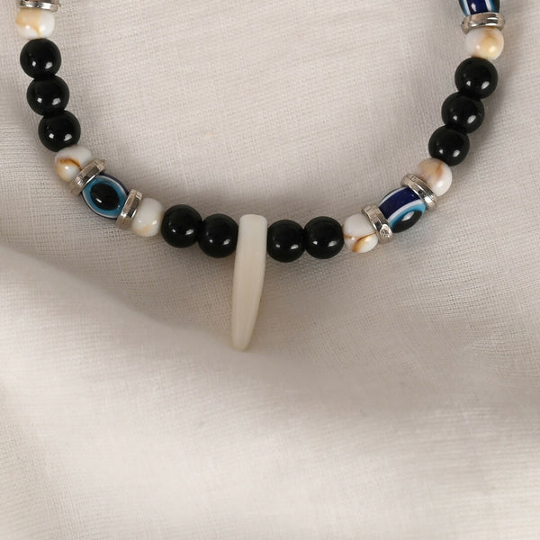 NVR Women & Men Black Evil Eye Rakhi With Roli Chawal - Distacart