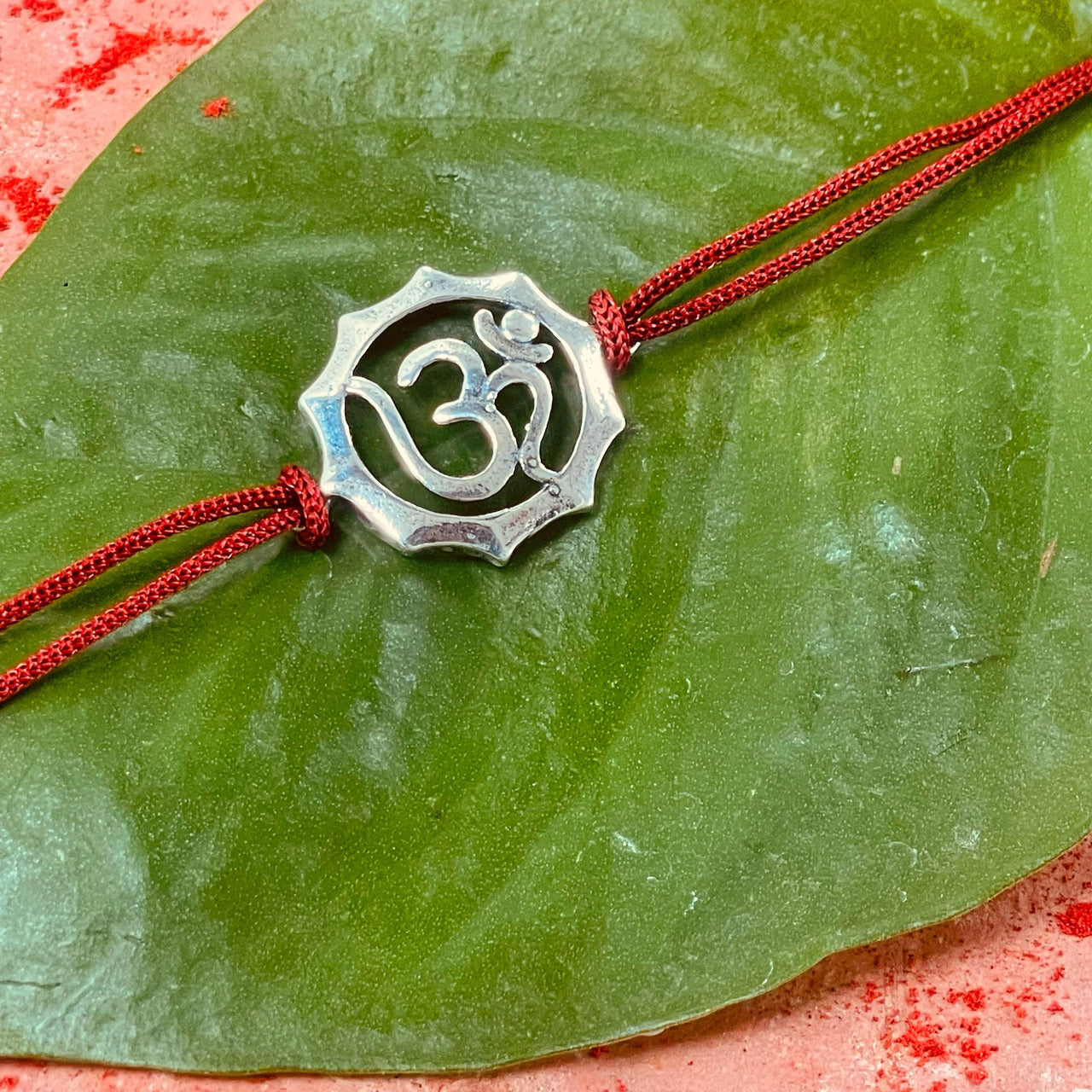 trueBrowns 925 Sterling Silver Embossed Om Thread Rakhi