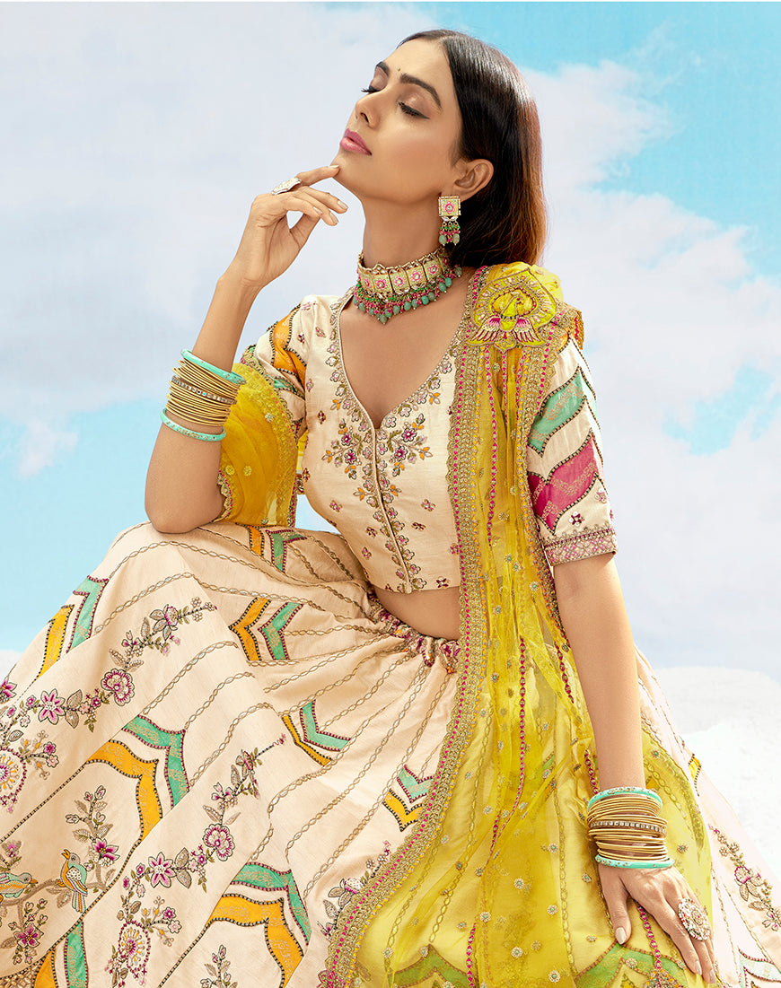 Monjolika Fashion Ivory & Yellow Silk Heavy Embroidered Wedding Lehenga Choli