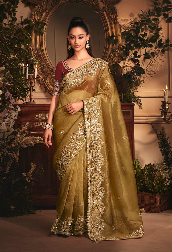 Monjolika Fashion Designer Golden Tissue Organza Saree With All Over Butta Work & Heavy Stone Embellished Border