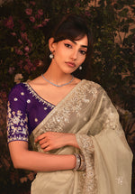 Thumbnail for Monjolika Fashion Designer Beige Tissue Organza Saree With All Over Butta Work & Heavy Stone Embellished Border