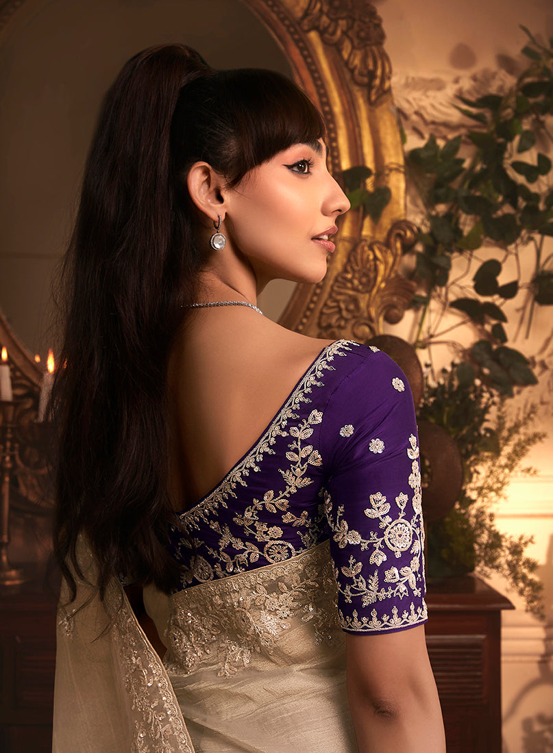 Monjolika Fashion Designer Beige Tissue Organza Saree With All Over Butta Work & Heavy Stone Embellished Border