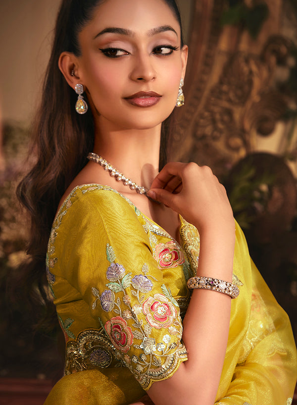 Monjolika Fashion Designer Mustard Tissue Organza Saree With All Over Butta Work & Heavy Stone Embellished Border