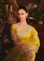 Thumbnail for Monjolika Fashion Designer Mustard Tissue Organza Saree With All Over Butta Work & Heavy Stone Embellished Border