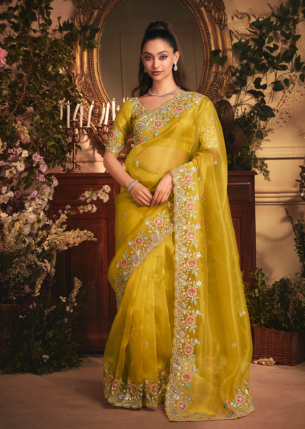 Monjolika Fashion Designer Mustard Tissue Organza Saree With All Over Butta Work & Heavy Stone Embellished Border
