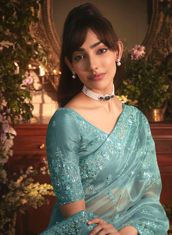 Monjolika Fashion Designer Aqua Blue Tissue Organza Saree With All Over Butta Work & Heavy Stone Embellished Border
