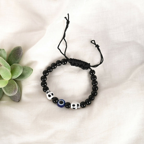 NVR Women & Men Black Evil Eye Rakhi With Roli Chawal - Distacart