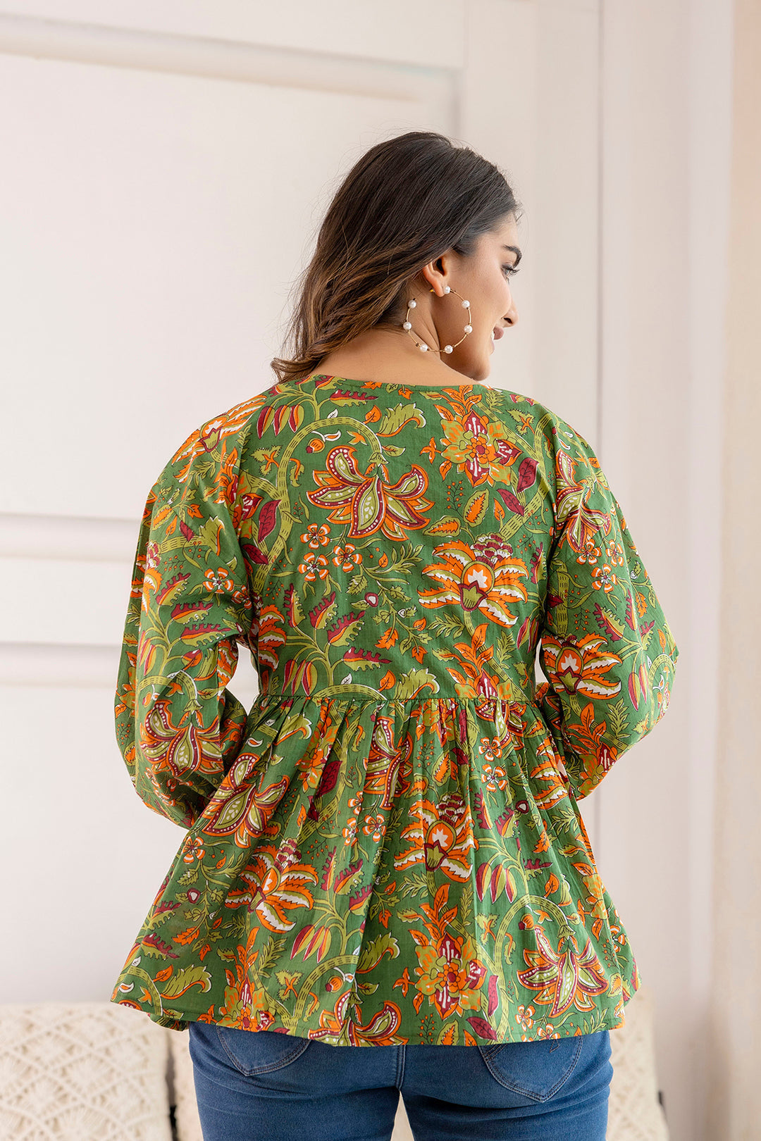 Women Green Printed V-Neck Peplum Tunic - Rasiya