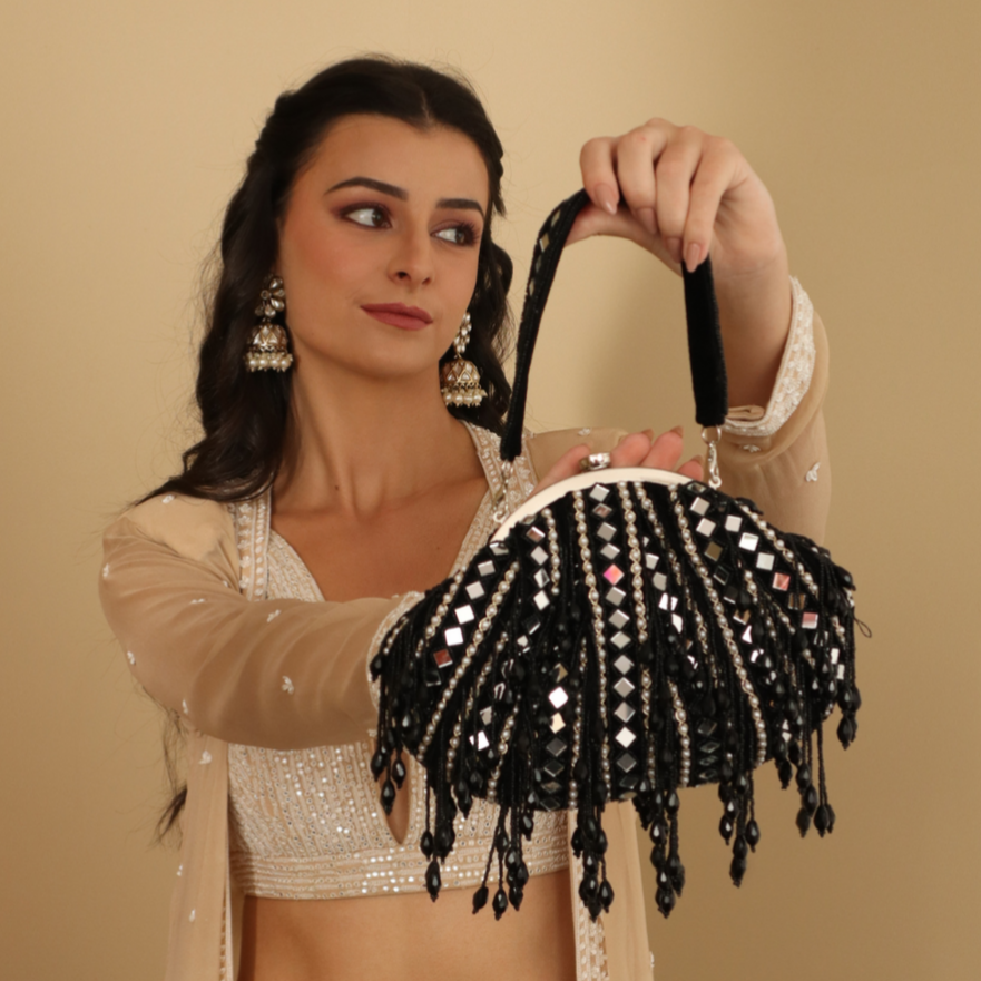 New Stylish Partywear Black Mirror Work Potli Bag for Womens by House of Ree