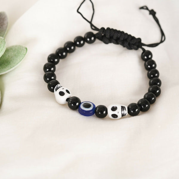 NVR Women & Men Black Evil Eye Rakhi With Roli Chawal - Distacart