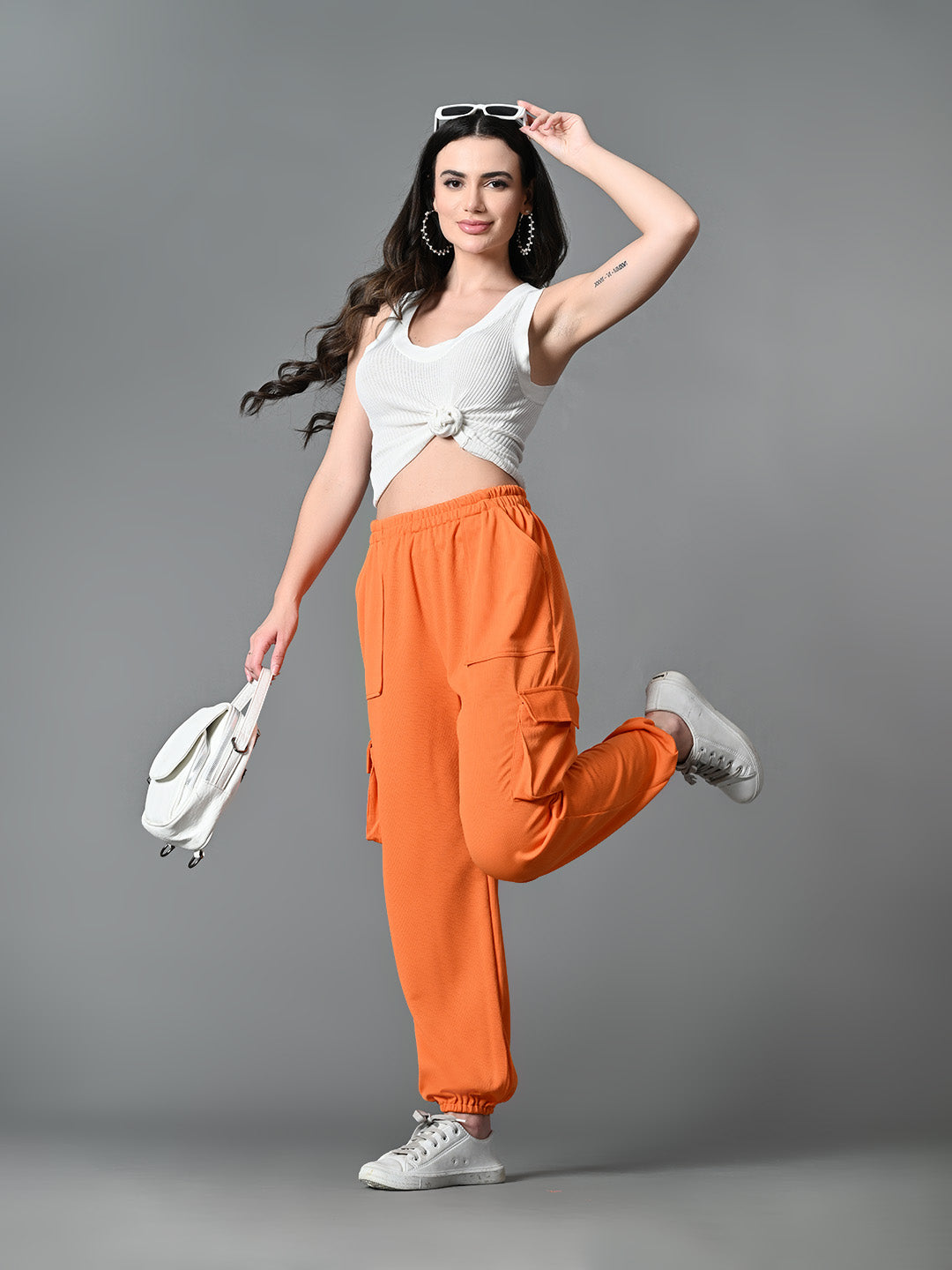 Myshka Women's Solid Ribbed High-Rise Cargo Style Casual Trousers in Orange Color