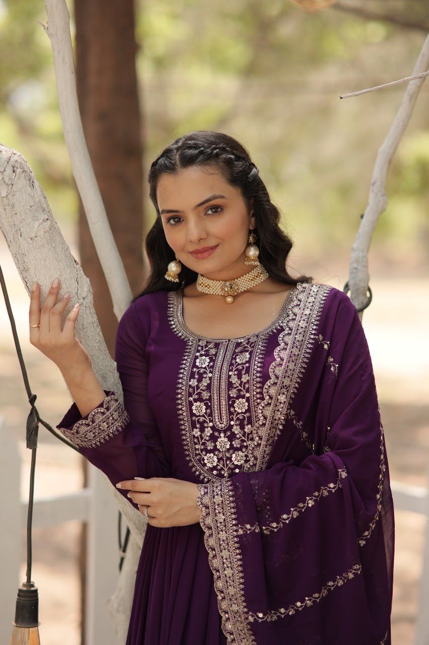 Evanik Purple Faux Blooming Gown with Dupatta With Attractive Embroidered Sequins work