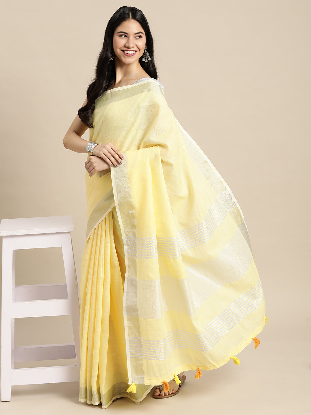 Astita Elegant Yellow Woven Linen Saree with Contrast Zari Border & Tassels - Soft & Breathable Party Wear - Distacart