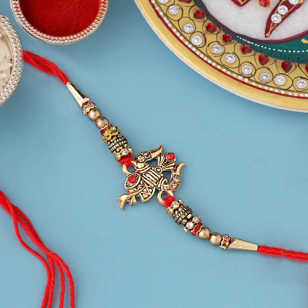 trueBrowns X Voylla Designer Ganesha Rakhi With Roli Chaawal Pack - Distacart