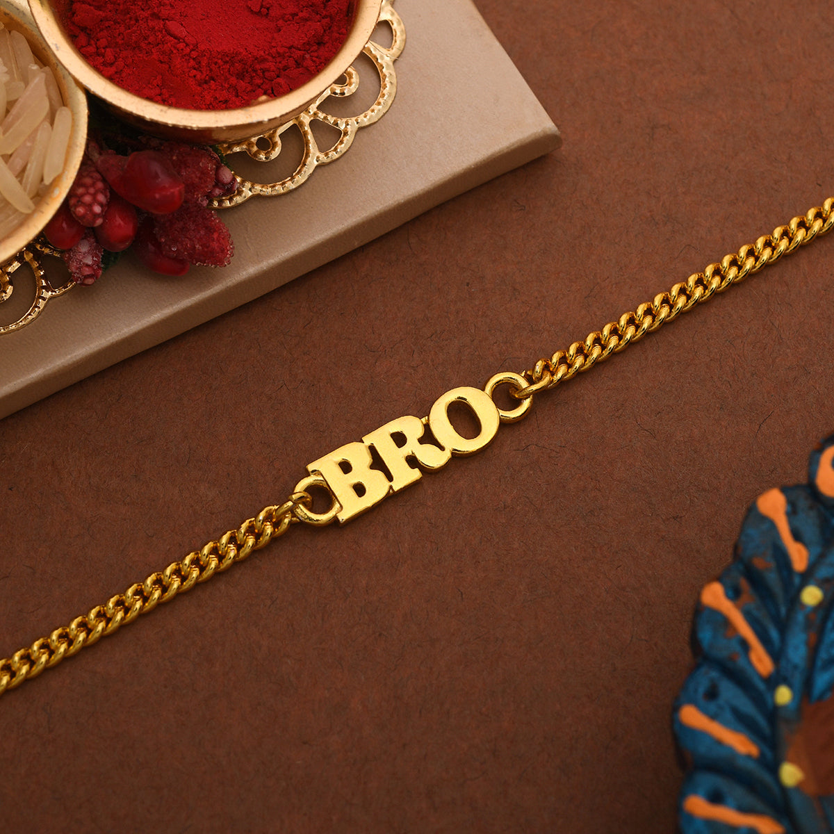 trueBrowns Gold Tone Fashionable BRO Rakhi