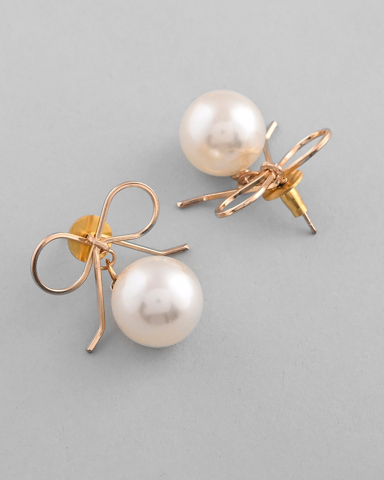 VOJ Gold Plated Pearl & Bow Shaped Classic Drop Earrings