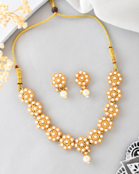 VOJ Gold Plated Pearl Studded Floral Necklace And Earrings