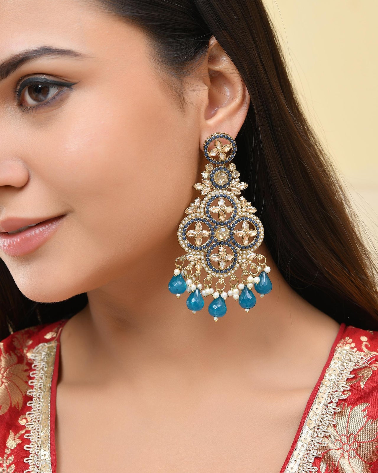 VOJ Blue Stone Studded Gold Plated Crescent Shaped Earrings