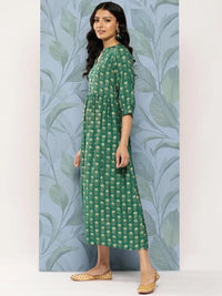 Thumbnail for https://cdn.shopify.com/s/files/1/0341/4805/7228/files/green-printed-silk-fit-and-flare-dress-libas-2.jpg?v=1739182223
