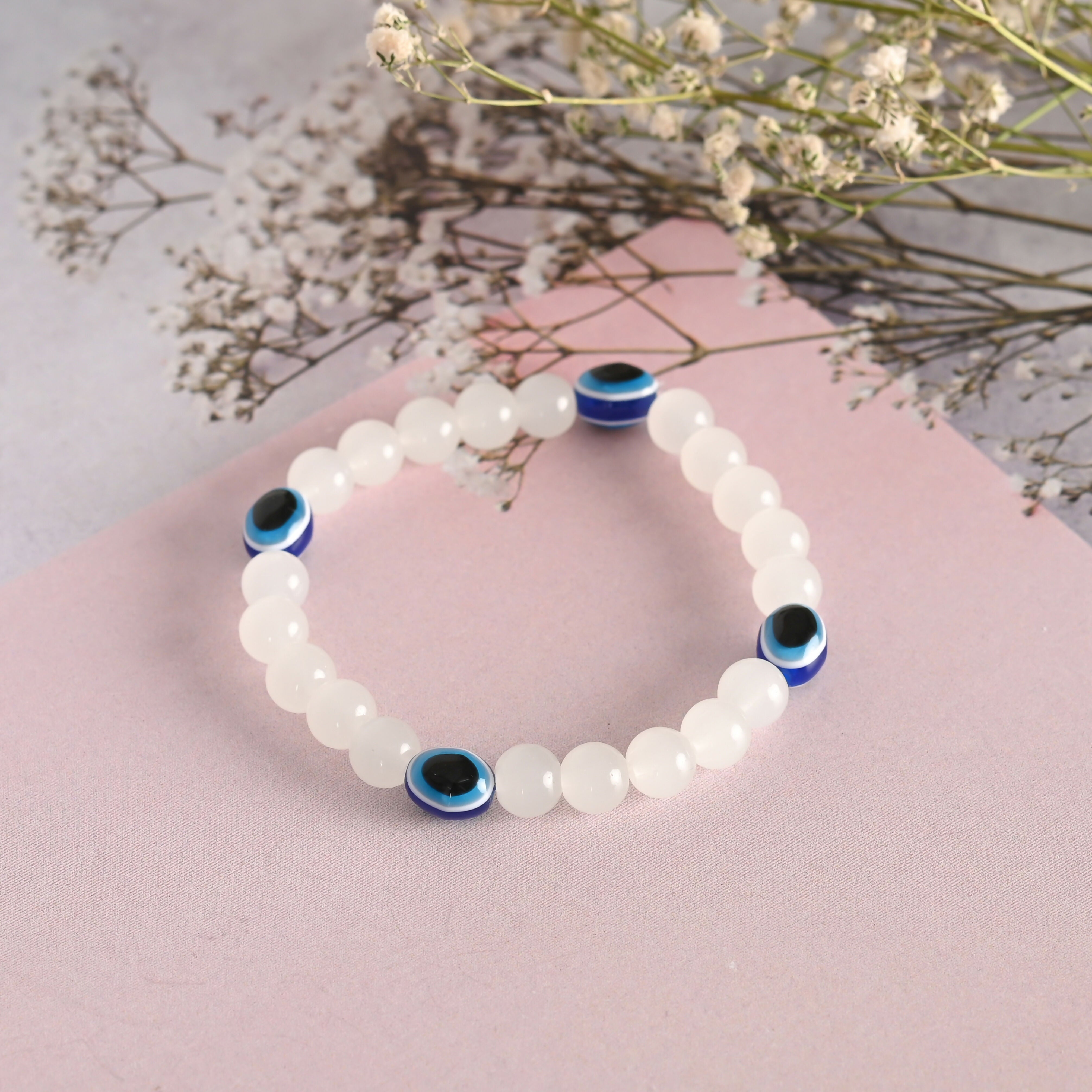 NVR Men & Women White Marbel Crystal Elasticated Bracelet - Distacart