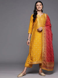 Thumbnail for https://cdn.shopify.com/s/files/1/0341/4805/7228/files/mustard-self-design-silk-blend-straight-kurta-with-trousers-and-dupatta-libas-1.jpg?v=1739541745