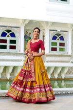 Thumbnail for Evanik Mustard Traditional Style Tussar Silk Patola Print With Foil Work Unstitched Lehenga Choli