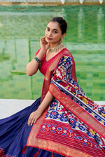 Thumbnail for Evanik Navy Blue Traditional Style Tussar Silk Patola Print With Foil Work Unstitched Lehenga Choli