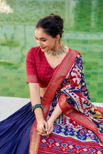 Thumbnail for Evanik Navy Blue Traditional Style Tussar Silk Patola Print With Foil Work Unstitched Lehenga Choli