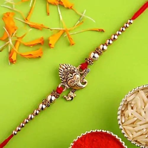 Auspicious Ganesha Rakhi And Almonds Jar - Distacart