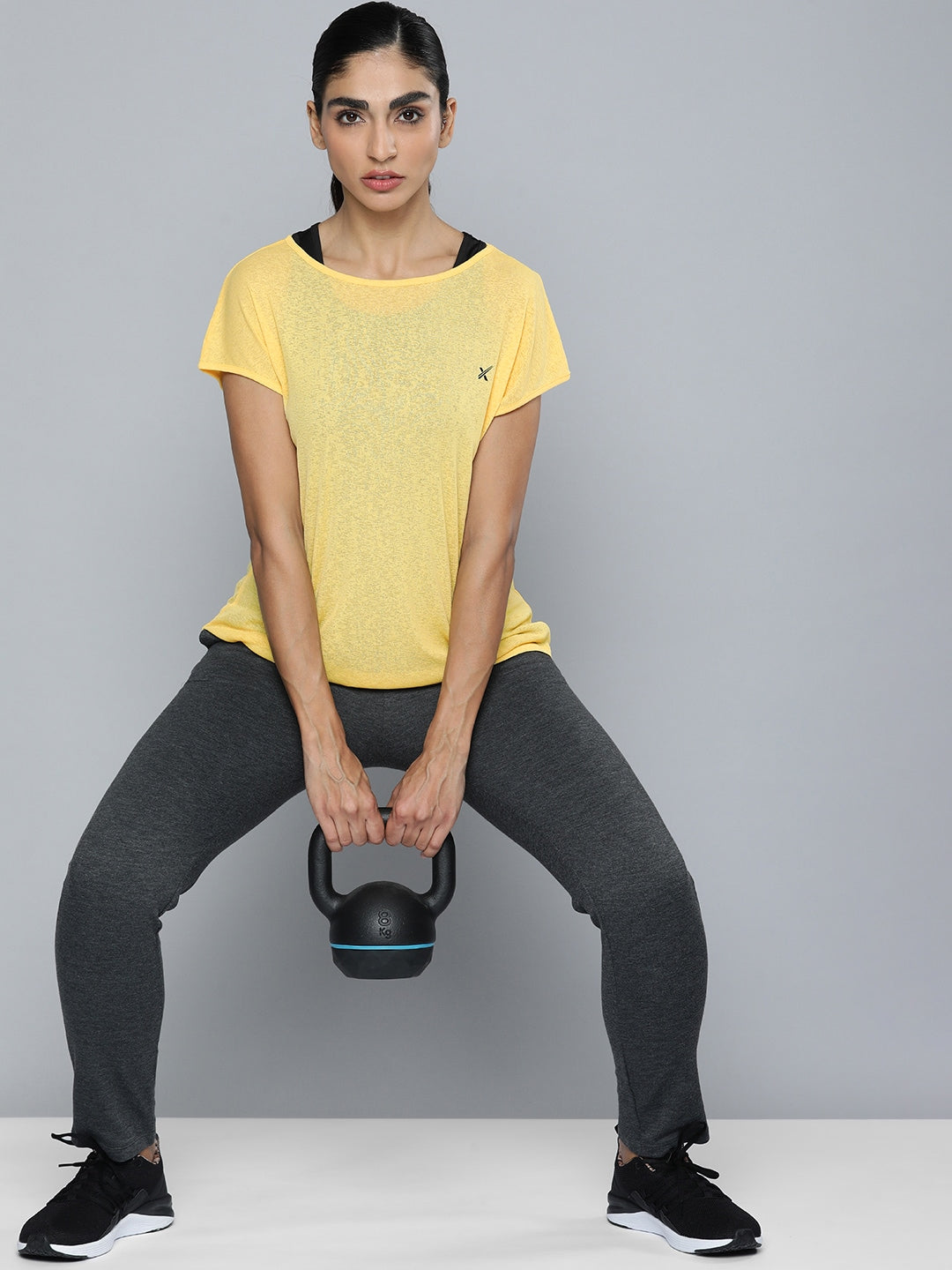 HRX by Hrithik Roshan Women Yellow & Black Pack of 2 Rapid-Dry Training T-shirt - Distacart