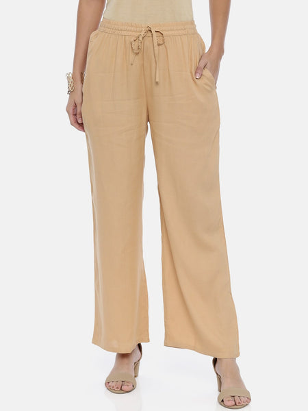 Souchii Beige Solid Flared Palazzos - Distacart