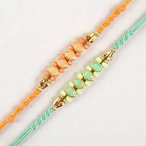 Set of 2 Fancy Pastel Rakhi and Fruit N Nut Chocolates - Distacart