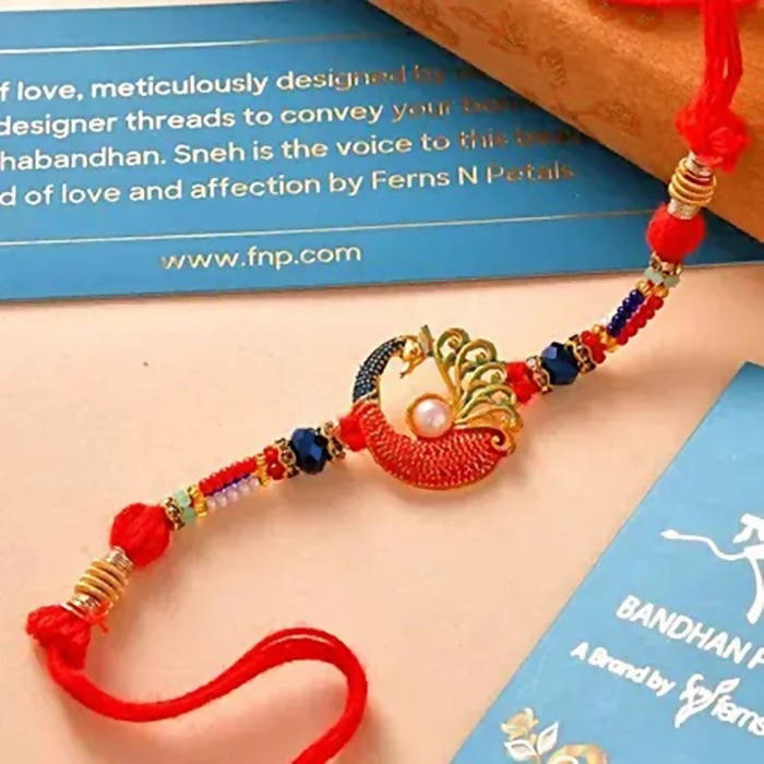 Peacock Rakhi And Kesar Pista Karachi Halwa