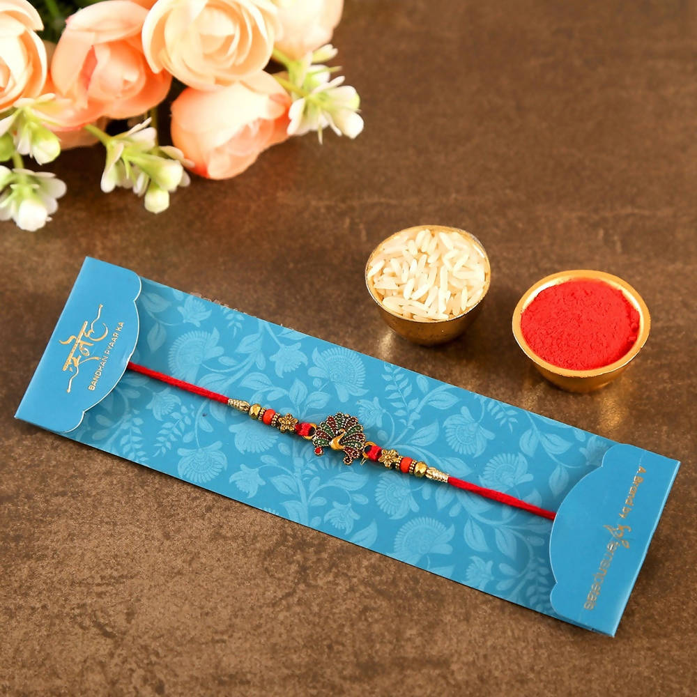 Beautiful Peacock Ethnic Rakhi & Cadbury Temptations - Distacart