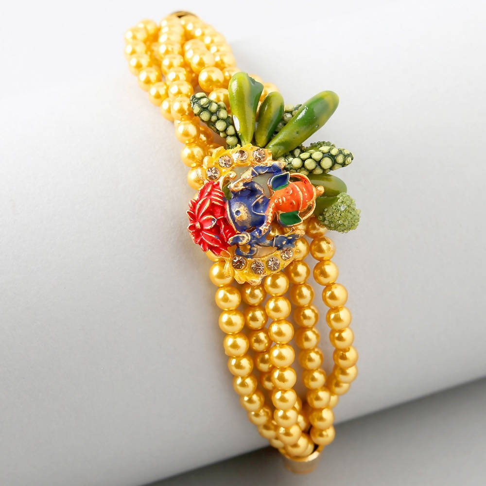 Vibrant Ganesha Rakhi & Cadbury Fruit N Nut Chocolates - Distacart