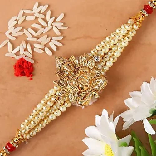 Ganesha Blessings Rakhi & Soan Papdi - Distacart