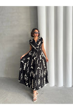 Thumbnail for Pimu V-Neck Maxi Dress with Black Graphic Print