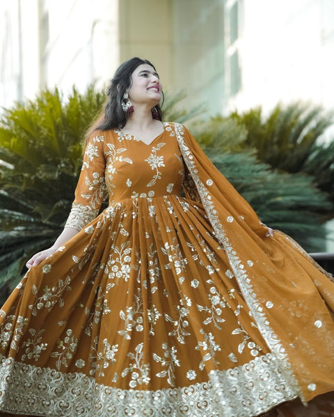 Yash Enterprise Mustard Georgette And Silk Embroidered Anarkali Salwar Suit
