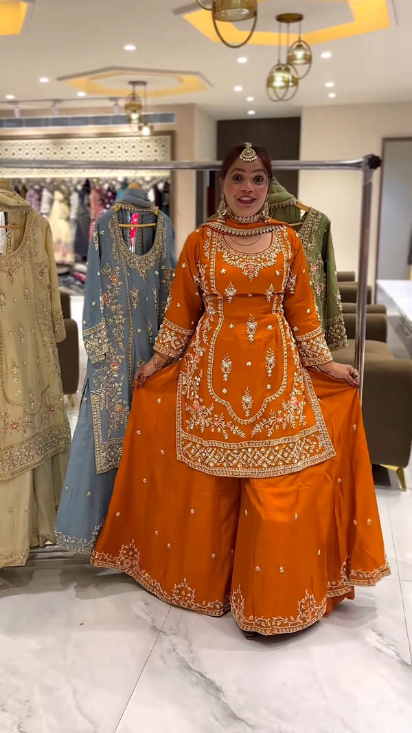 Yash Enterprise Orange Natural Crep Embroidery Party Wear Suit Set