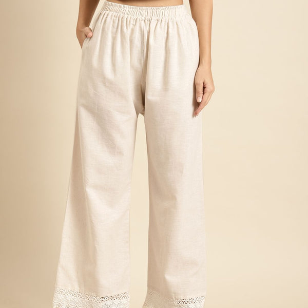 TAG 7 Women Off-White Solid Hem Design Straight Palazzos - Distacart