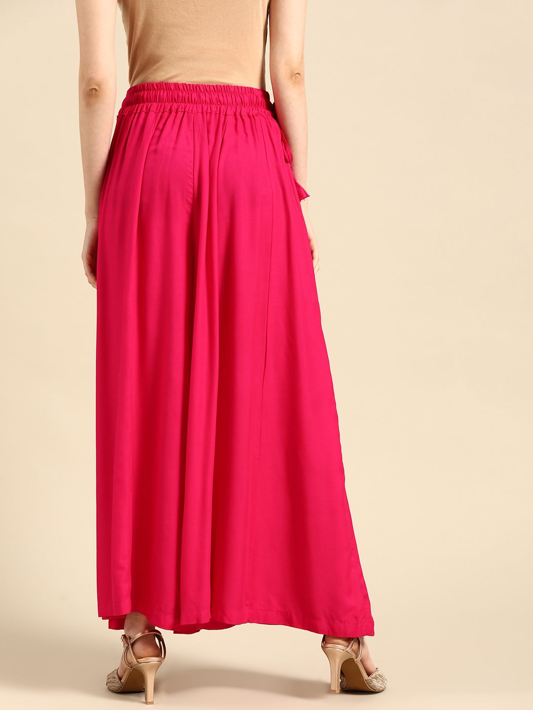 TAG 7 Women Magenta Solid Flared Palazzos