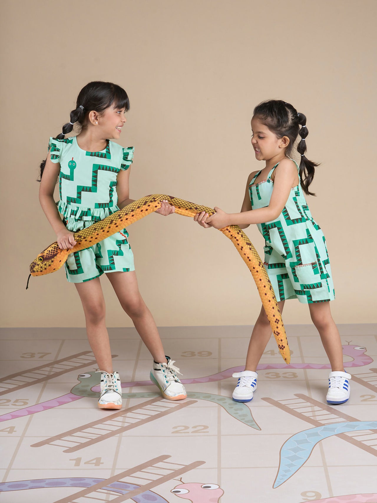 Snakes and Ladders Girls Green Table Print Jumpsuit from Siblings Collection - Distacart