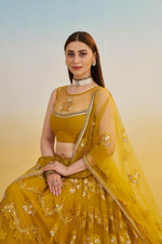 Thumbnail for Aastha Fashion Mustard Yellow Butterfly Net Tone To Tone Cotton Thread Work And Sequence Work Embroidery Wedding Wear Lehenga Choli - Distacart