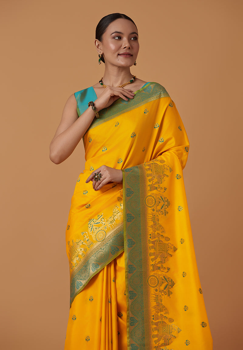 Monjolika Fashion Yellow Banarasi Silk Blend SareeWith Traditional & Modern Dulha Dulhan Figure Zari Woven Detailing - Distacart
