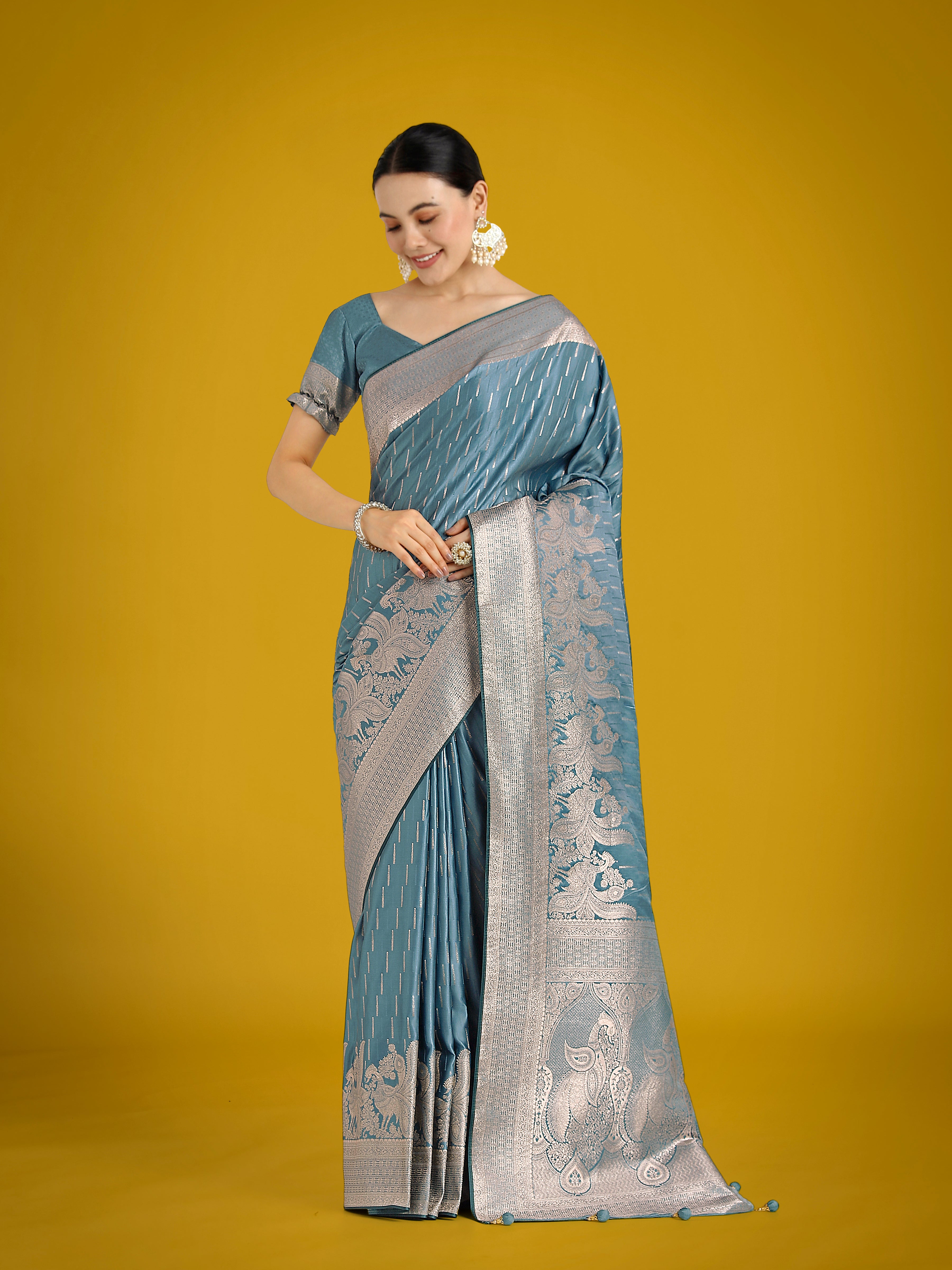 Monjolika Fashion Dusty Cyan Weaving Banarasi Satin Silk Trendy Saree For Festival