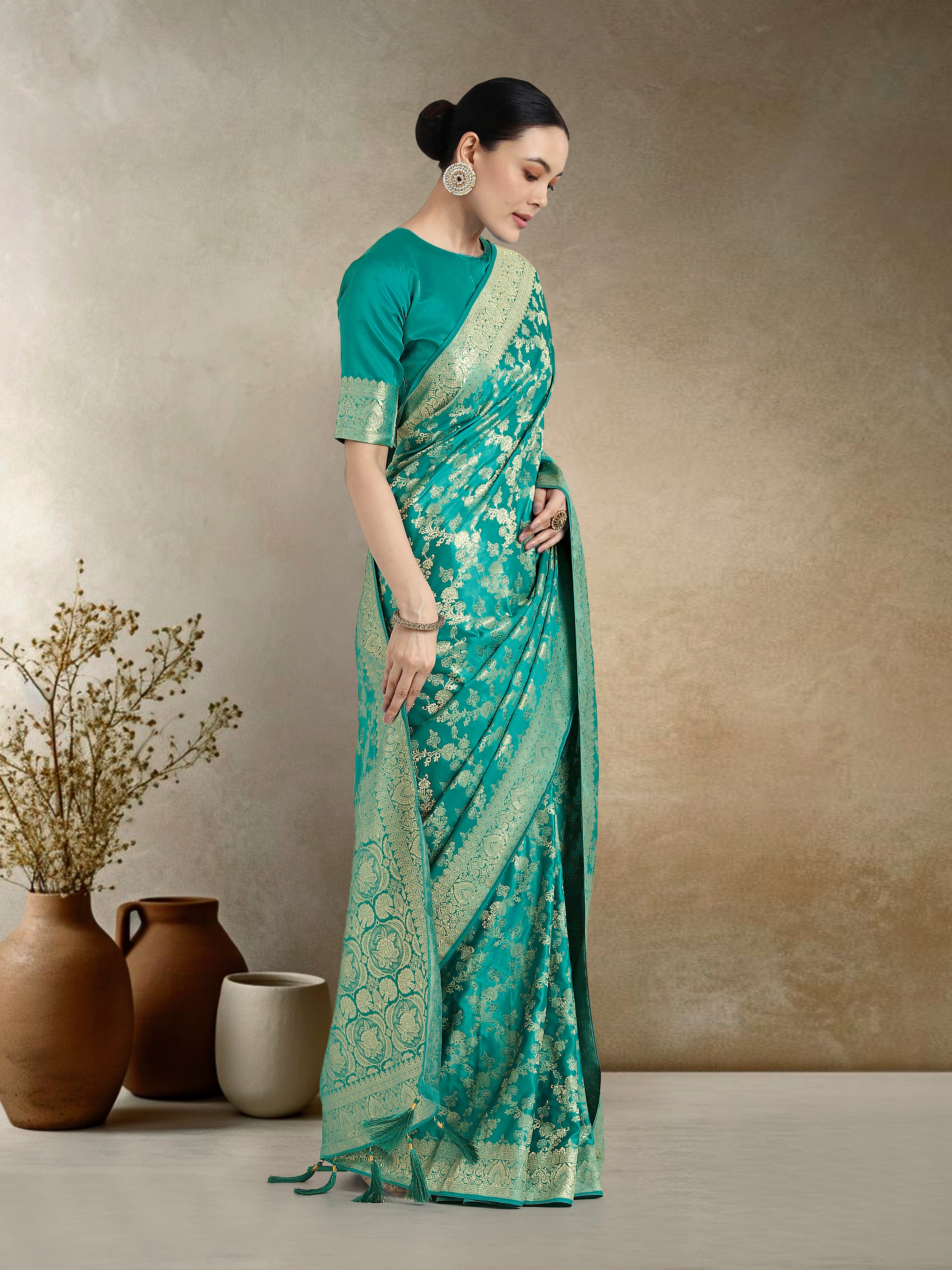 Monjolika Fashion Effervescent Turquoise Soft Banarasi Satin Silk Saree With Elision Blouse Piece