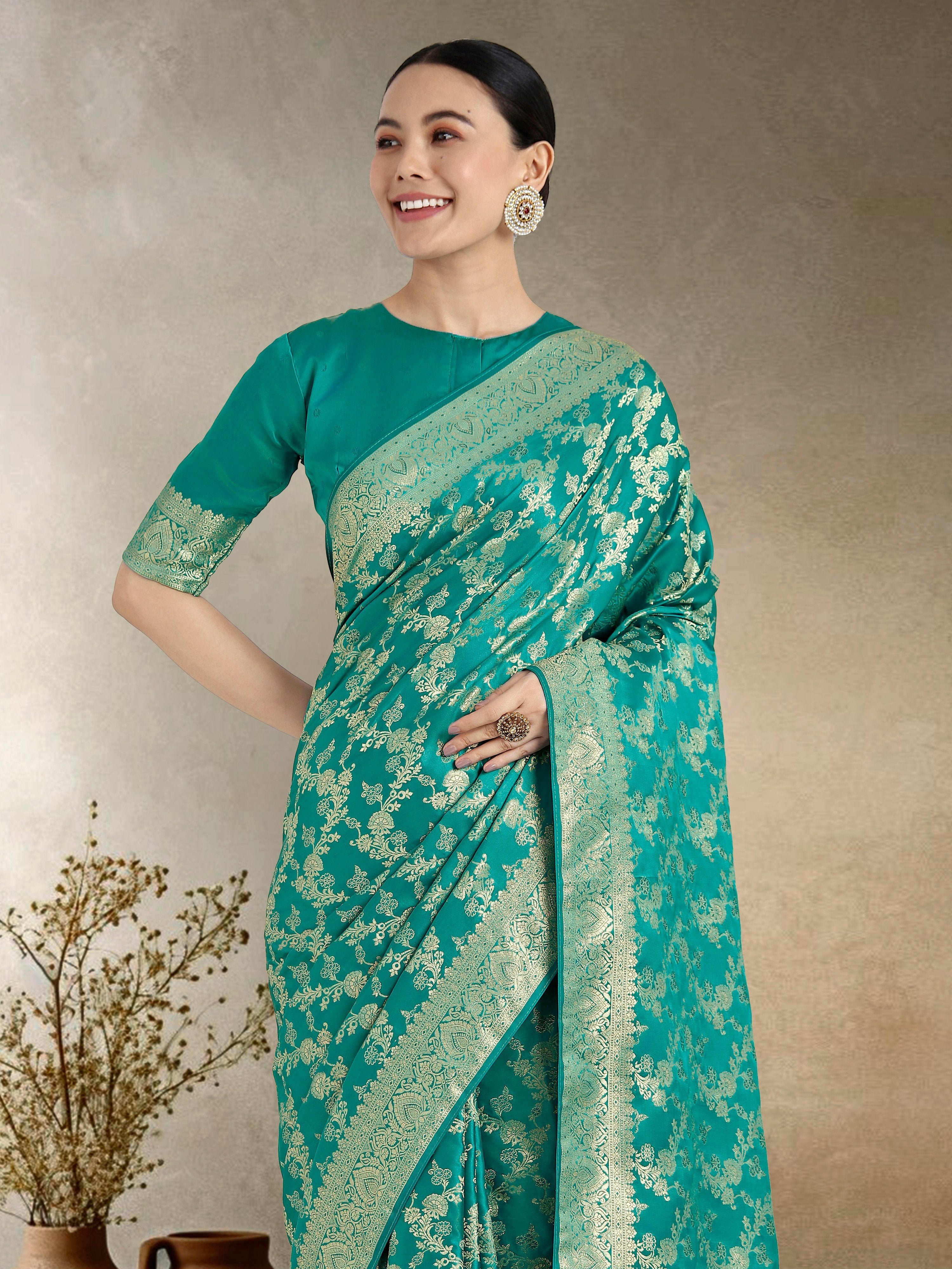 Monjolika Fashion Effervescent Turquoise Soft Banarasi Satin Silk Saree With Elision Blouse Piece